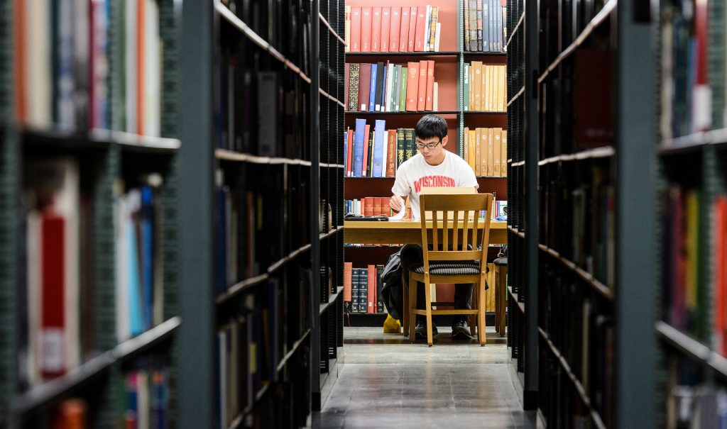 Person studying in library