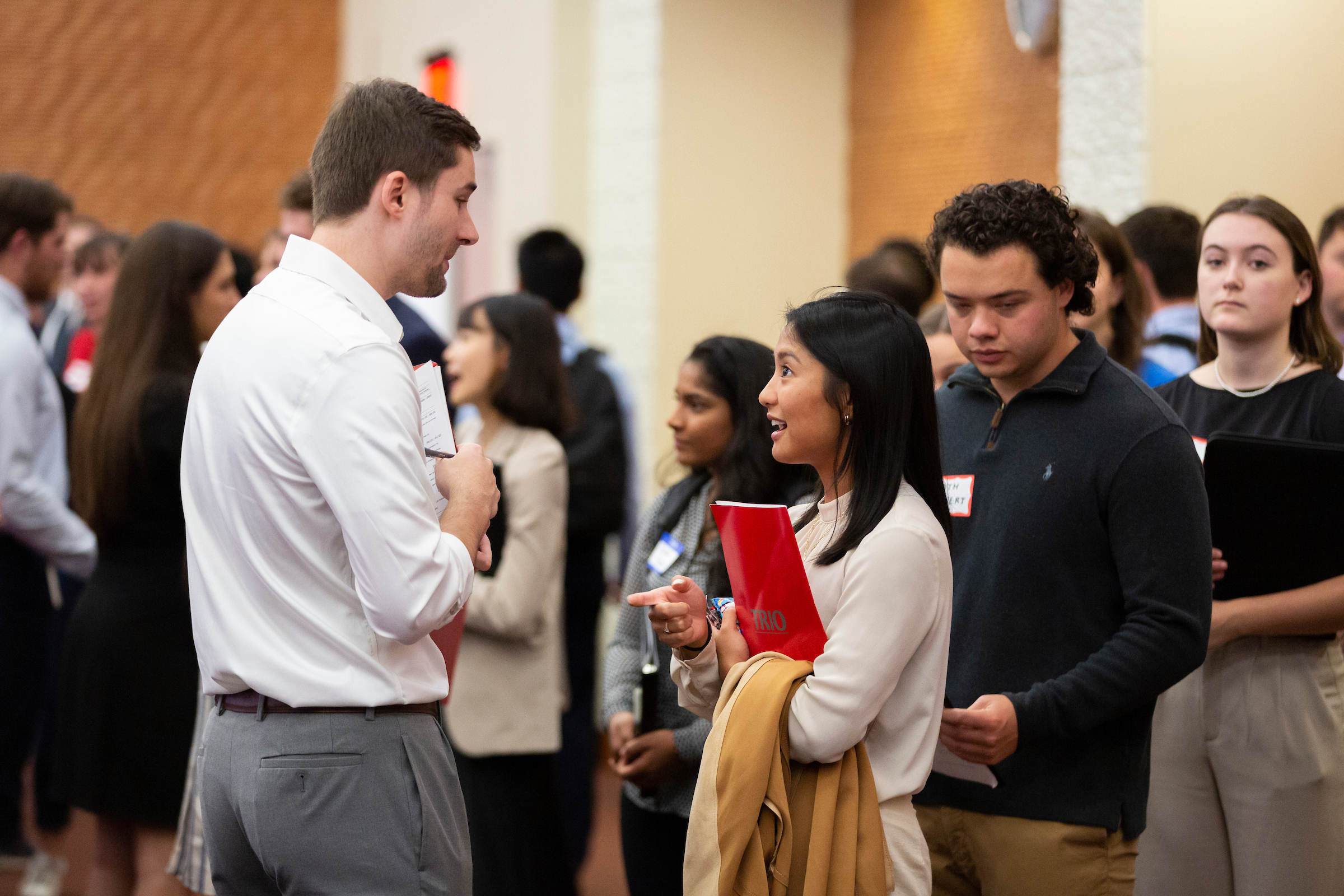 people talking at a career fair