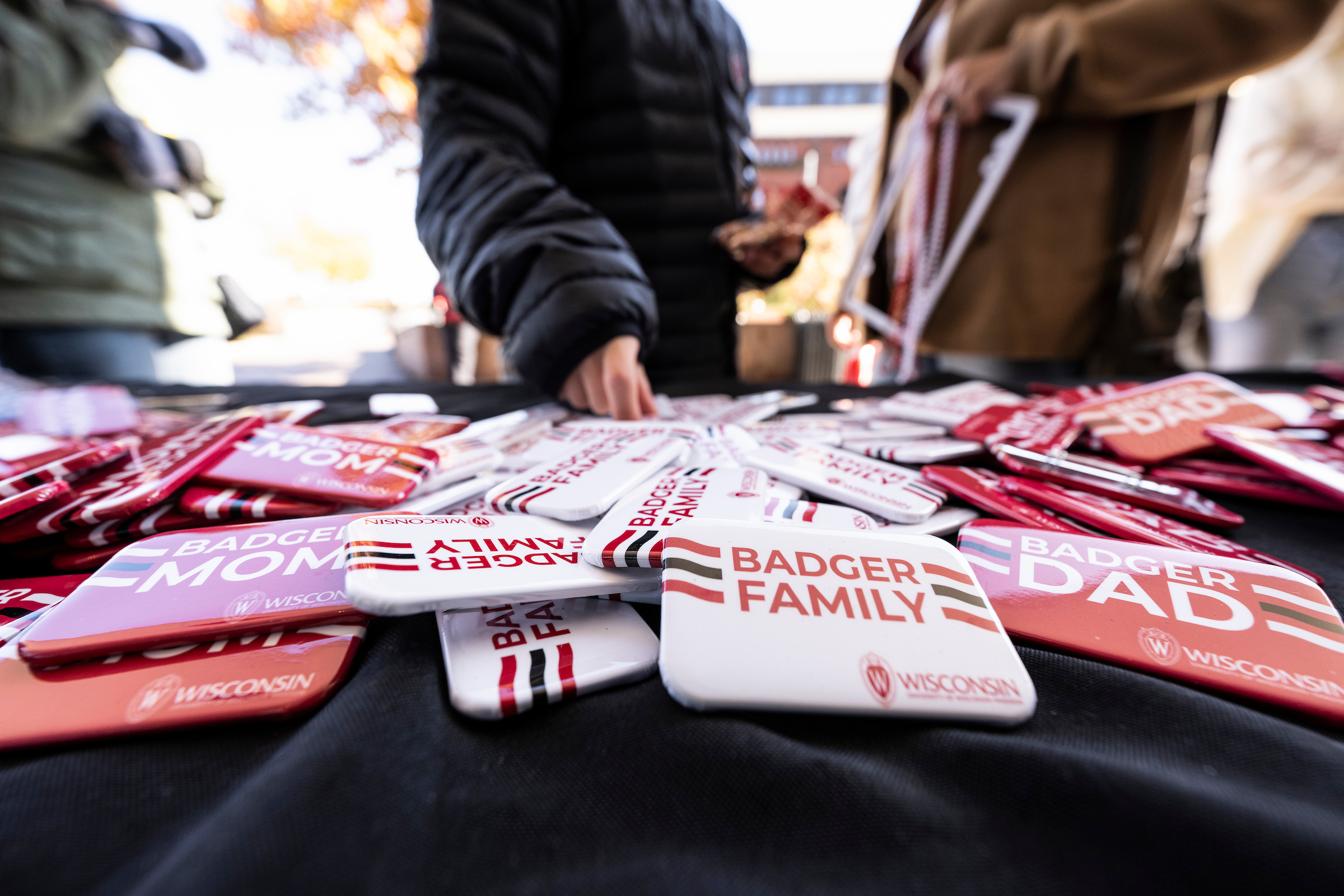 Branded clothes and gifts putting on the desk for giving out.