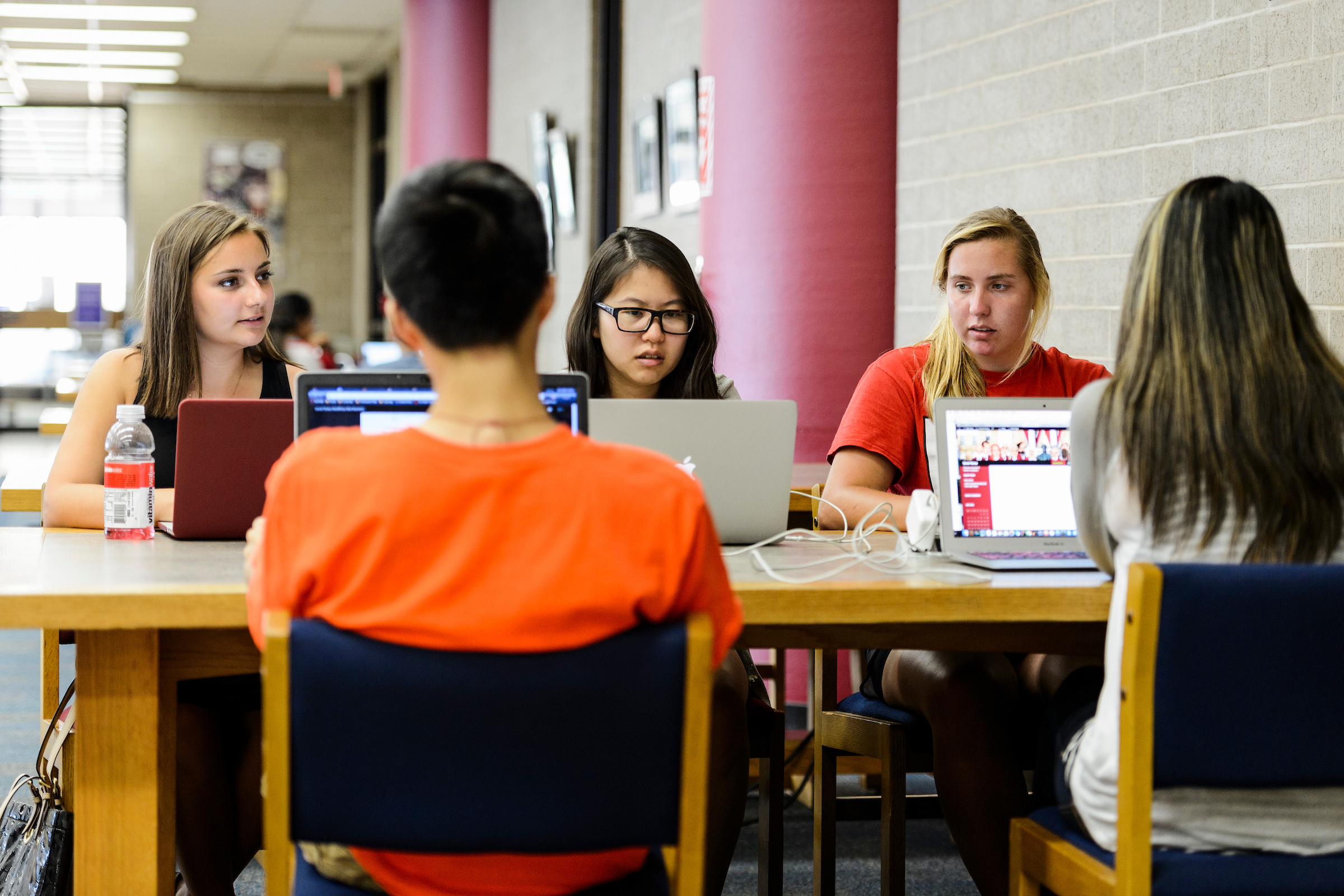 People studying in library