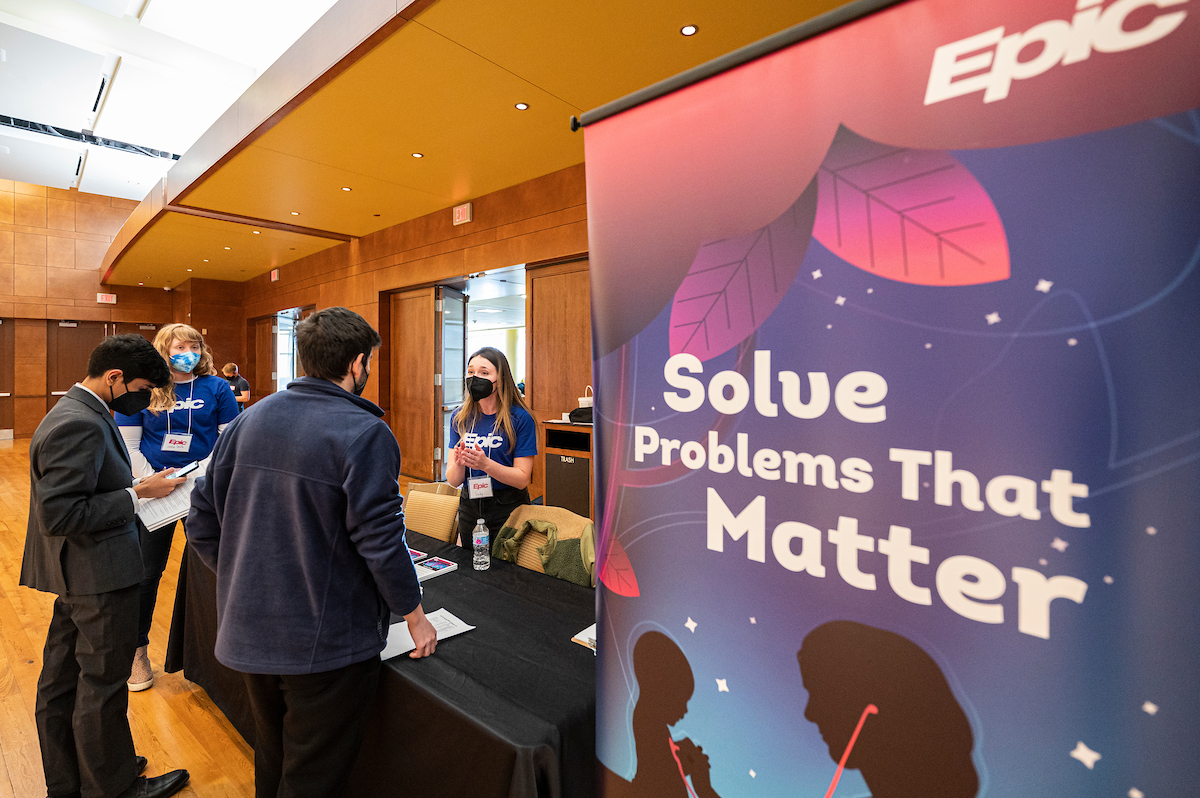 students talking to epic employees at the CDIS career fair