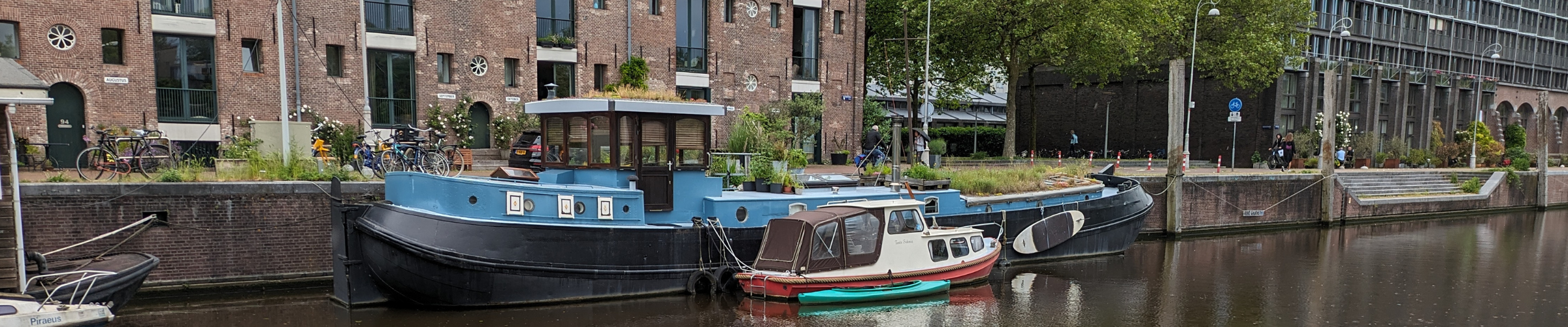 Two boats tied up in a canal