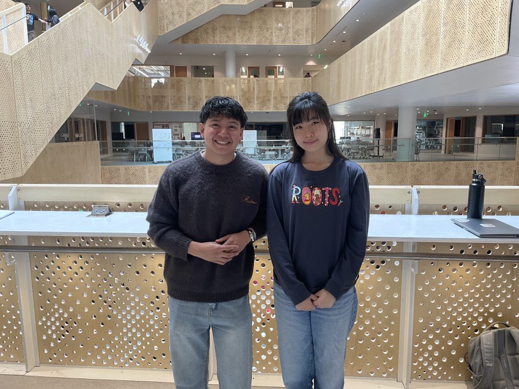 Two students inside building