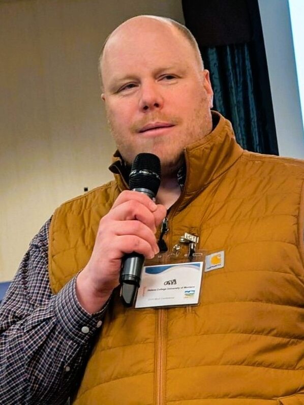 Man with microphone in vest