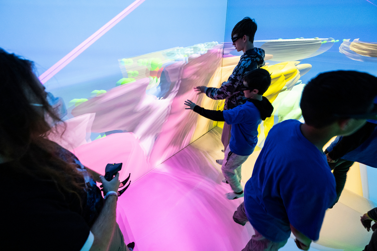 Kids touching large screen